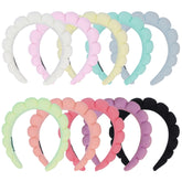 RAISEY 10pc spa headband set in color variety for comfortable skincare sessions.