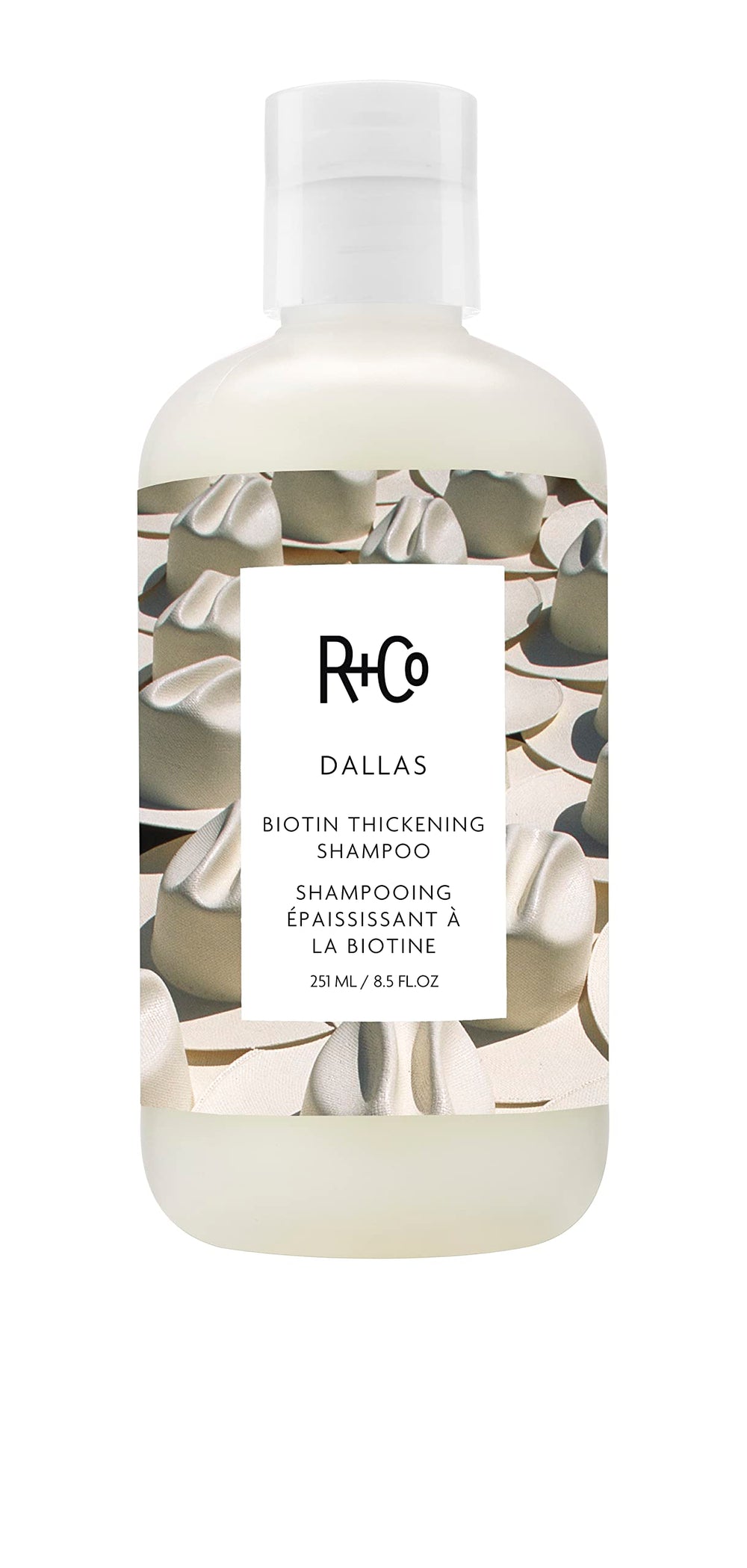 R+Co Dallas thickening shampoo bottle closeup highlights volumizing potential