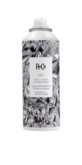 R+Co Foil Frizz + Static Control Spray bottle front view for smooth hair with shine.
