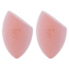 Real Techniques Miracle Powder Sponge flat-edge for packing on product evenly.