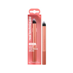 Real Techniques Spot Concealer Brush precision tip targets blemishes for precise coverage.