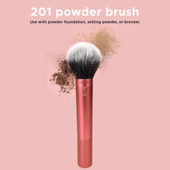 Real Techniques brush shown with setting powders for a soft matte finish.