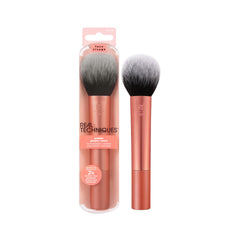 Real Techniques Ultra Plush Powder Brush dome head for even powder application.