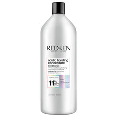 Redken Acidic Bonding Concentrate conditioner bottle close-up showing strong, color-safe conditioning benefits