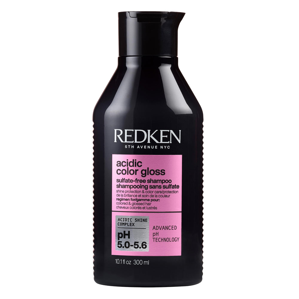 Redken Acidic Color Gloss Shampoo bottle emphasizes color protection and salon-grade shine.