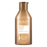 Redken All Soft conditioner pump bottle for easy application and deep hydration.