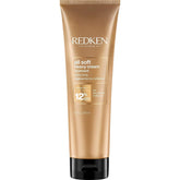 Redken All Soft Heavy Cream bottle pour shows easy application for nourished hair