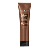 Redken All Soft Mega Hydramelt bottle pour showing easy application and deep hydration.