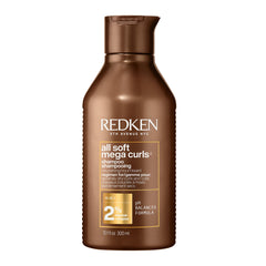 Redken All Soft Mega Curls Shampoo bottle pour hydrates very dry curls for smoother texture.