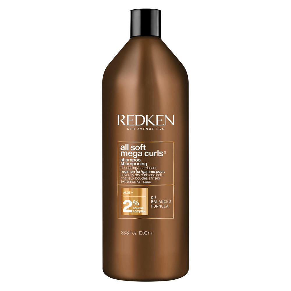 Redken All Soft Mega Curls Shampoo bottle shows a sulfate-free cleanse for dry curls.