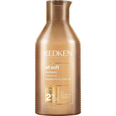 Redken All Soft Shampoo bottle with argan oil for hydrated, soft hair.