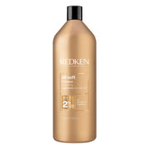 Redken All Soft shampoo bottle with argan oil delivering deep hydration