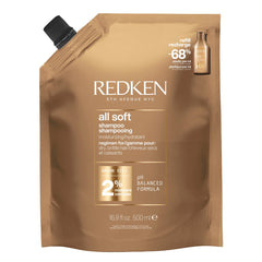 Redken All Soft Shampoo bottle pour demonstrates gentle cleansing for dry hair