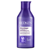 Redken Blondage Purple Conditioner bottle tones blondes with violet pigments.
