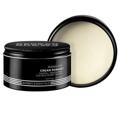 Redken Brews Cream Pomade jar closeup showing smooth texture and low shine.