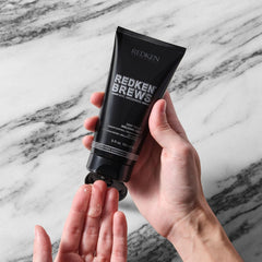Redken Brews Holding Gel shine finish suggests natural movement
