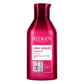 Redken Color Extend Magnetics conditioner bottle pour shows color-safe nourishment.