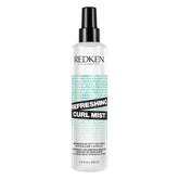 Redken Curl Refreshing Mist bottle shows on-the-go hydration and curl definition.