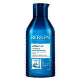 Redken Extreme Conditioner bottle showing strength-focused formula for damaged hair.