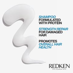 Redken Extreme Shampoo lather closeup, demonstrating rich foam for gentle cleansing.