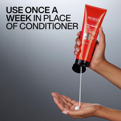 Babassu oil focus image emphasizes nourishing, frizz-control care by Redken