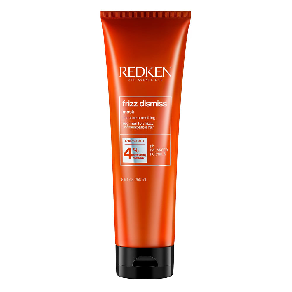 Redken Frizz Dismiss Mask bottle highlighting smoothing technology for frizz-prone hair