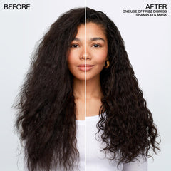 Hand applying Redken Frizz Dismiss shampoo to tame frizz.