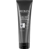 Redken Scalp Relief Dandruff Shampoo bottle shows a dermatologist-tested formula for dandruff control.
