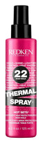 Redken Thermal Spray 22 bottle closeup highlighting heat protection up to 450°F.