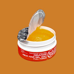 Redone Hair Wax Orange bottle label detail emphasizing high shine finish.