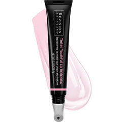 Revision Skincare Tinted YouthFull Lip Replenisher tube closeup shows personalized pink tint and hydration.