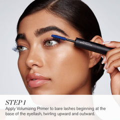 RevitaLash mascara brush closeup showing rich pigment and buildable volume.