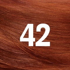 Revlon ColorSilk bond repair complex label closeup highlighting hair repair benefits.