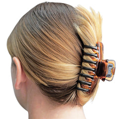 REVLON no-pulling clip protects strands while styling