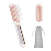 RHOS folding brush with mirror in compact form for on-the-go touch-ups.
