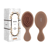 RHOS Mini Hair Brush pocket-size detangler for on-the-go smoothing.