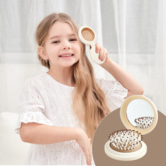 RHOS easy-to-use foldable brush detangles hair with a gentle press.