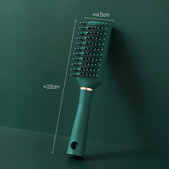 RN BEAUTY detangling brush featuring anti-static pins to reduce frizz