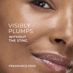 Close-up of RoC Lip Volumizer on lips highlighting plump, defined contours