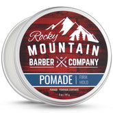 Pomada Rocky Mountain Barber Company en lata de 5 oz para fijación duradera.