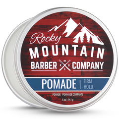Pomada Rocky Mountain Barber Company en lata de 5 oz para fijación duradera.