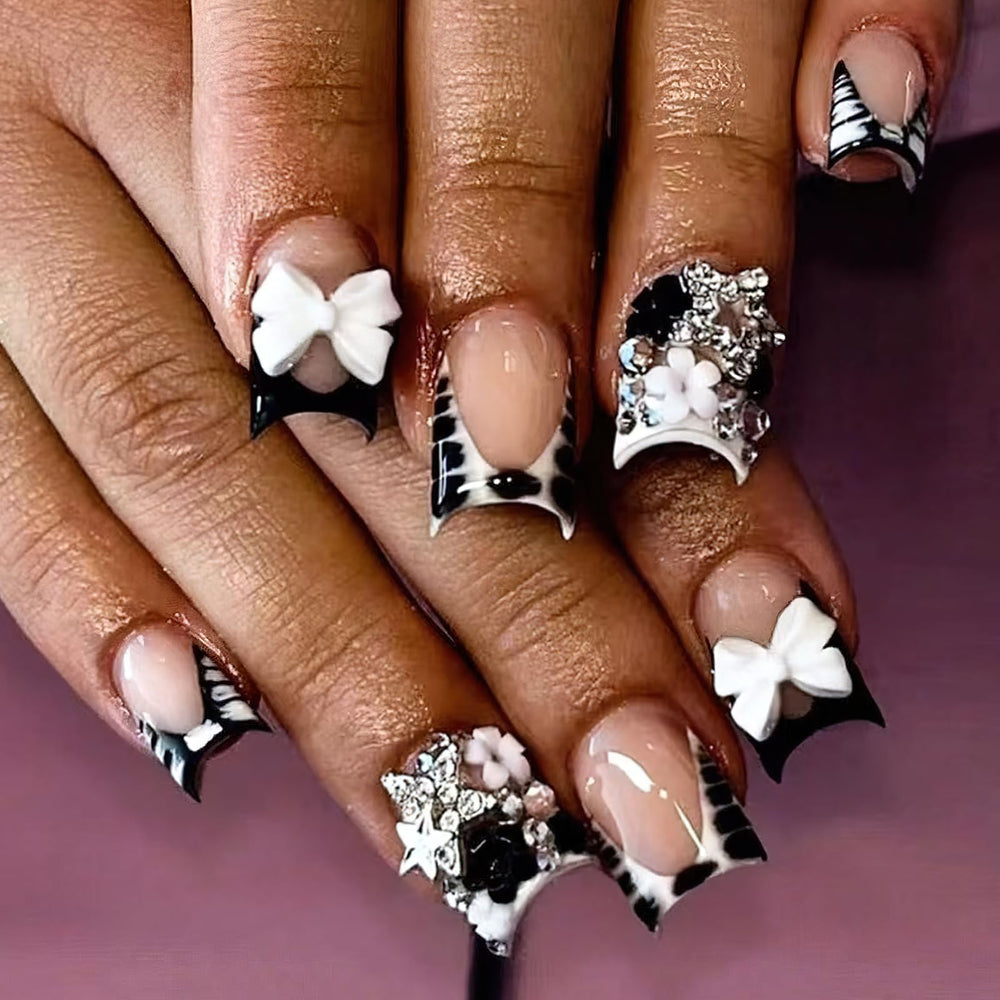 ROFIBUT nails with zebra print French tip for fast at-home glam.