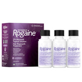 Rogaine Women 2% Minoxidil bottle ready for daily scalp treatment