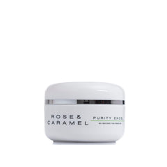 Rose and Caramel Purity Excel bottle close-up showing sleek self tan remover.