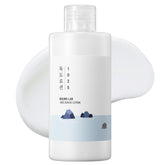 ROUND LAB 1025 Dokdo Loción – botella elegante, hidratación suave para piel sensible, uso diario.