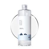ROUND LAB 1025 Dokdo Toner bottle closeup showing hydrating formula.