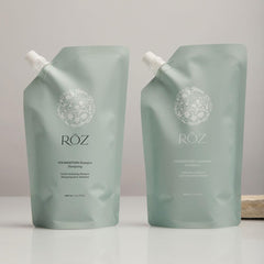 RŌZ Foundation Shampoo bottle on sink ready for daily cleansing and styling.