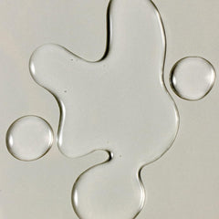 ROZ Santa Lucia Styling Oil bottle highlights frizz control in humidity