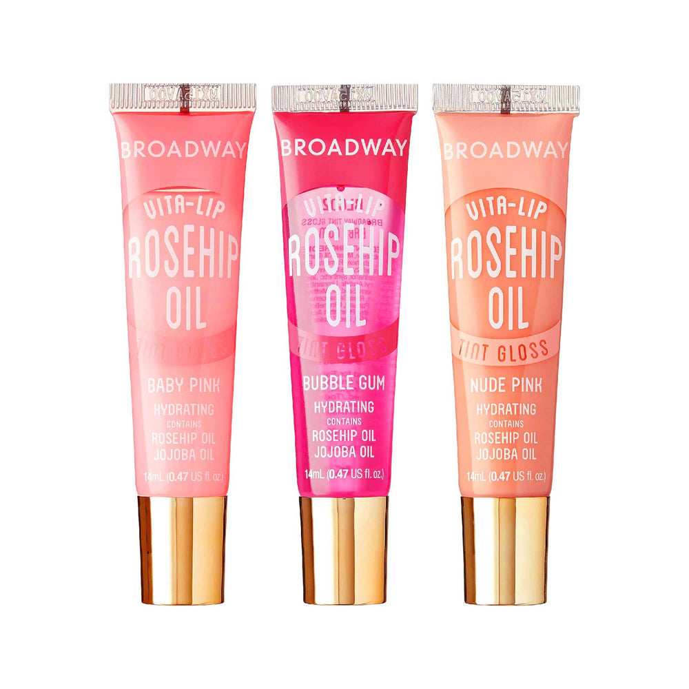 Ruby Kisses Broadway Vita-Lip en rosa bebé, brillo duradero para labios hidratados.