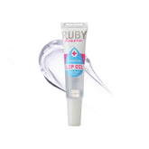 Ruby Kisses aceite para labios, enfoque en el bote transparente para hidratación profunda.